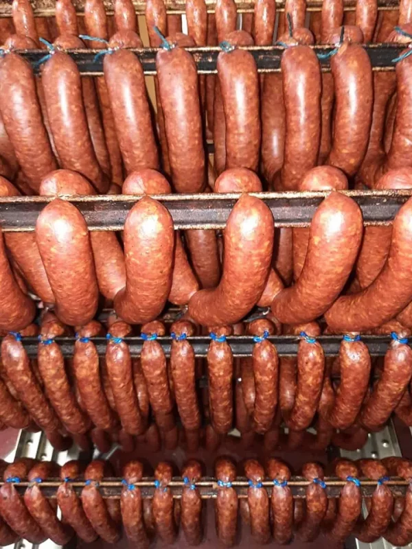 a group of sausages on a rack