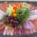 a platter of meat and vegetables